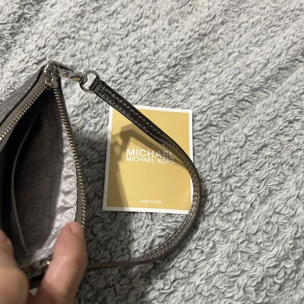 Michael Kors Silver Logo Wristlet NWOT